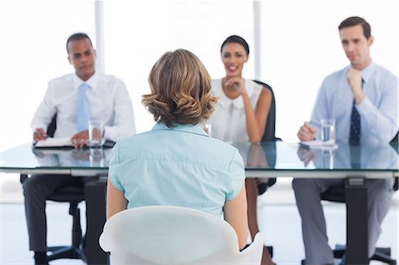 simsearch:6109-06685002,k - Female applicant sitting during a job interview Stock Photo - Premium Royalty-Free, Code: 6109-06781334