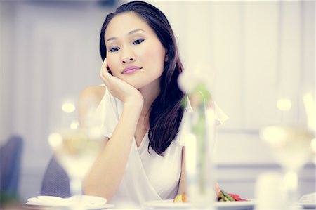 sophisticate - Thoughtful beautiful woman at meal table Stock Photo - Premium Royalty-Free, Code: 6109-07600883