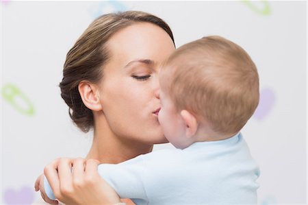 simsearch:6109-07601002,k - Affectionate mother kissing baby Photographie de stock - Premium Libres de Droits, Code: 6109-07600993