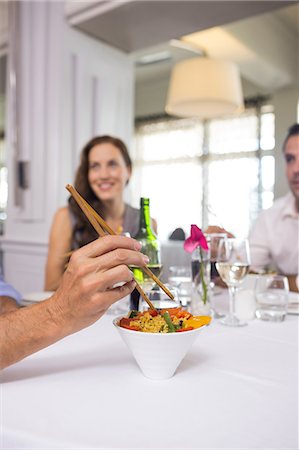 simsearch:6109-07600958,k - Business colleagues around dining table in restaurant Stock Photo - Premium Royalty-Free, Code: 6109-07600916