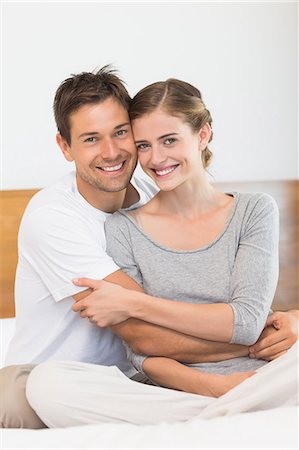 simsearch:6109-07601273,k - Happy couple smiling at camera Stock Photo - Premium Royalty-Free, Code: 6109-07601254