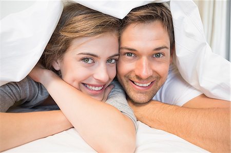 simsearch:6109-07601273,k - Happy couple under the duvet Stock Photo - Premium Royalty-Free, Code: 6109-07601267