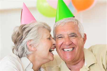 Senior couple celebrating a birthday together Stock Photo - Premium Royalty-Free, Code: 6109-07601463