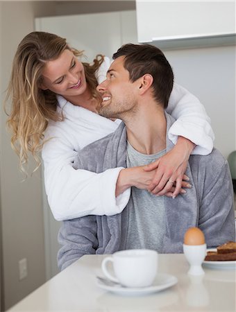 robe man - Loving couple looking at each other in kitchen Stock Photo - Premium Royalty-Free, Code: 6109-07601559