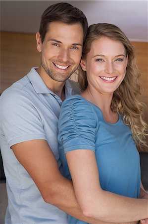 pareja - Portrait of a loving couple smiling Foto de stock - Sin royalties Premium, Código: 6109-07601561