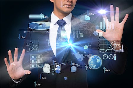 Businessman touching interface with graphics Foto de stock - Sin royalties Premium, Código: 6109-07601583