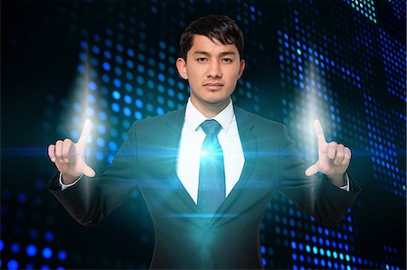 future technology - Serious businessman touching lights Foto de stock - Sin royalties Premium, Código: 6109-07601591