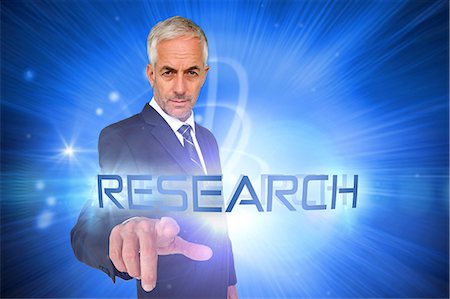 simsearch:614-06442504,k - Research against shiny futuristic sphere Foto de stock - Sin royalties Premium, Código: 6109-07601745