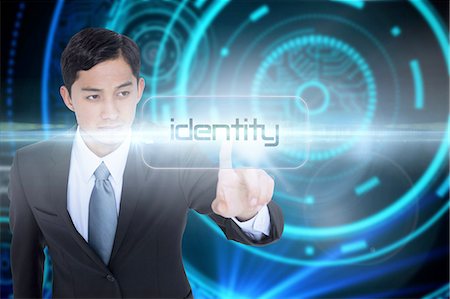 die stirn in falten legen - Identity against futuristic technological background Stockbilder - Premium RF Lizenzfrei, Bildnummer: 6109-07601738