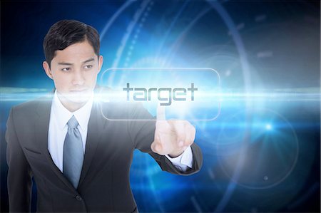 Target against futuristic black background with circles Stock Photo - Premium Royalty-Free, Code: 6109-07601739