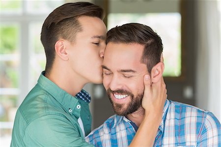 simsearch:6109-08203699,k - Homosexual couple men kissing each other Stock Photo - Premium Royalty-Free, Code: 6109-08203584