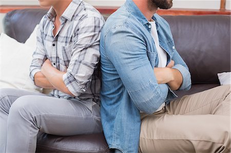 simsearch:6109-08435383,k - Homosexual couple men giving back to back Stock Photo - Premium Royalty-Free, Code: 6109-08203595