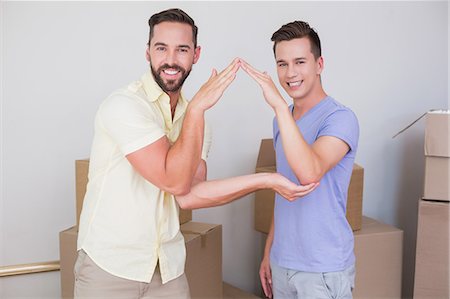 simsearch:6109-08390455,k - Happy homosexual couple gesturing together Fotografie stock - Premium Royalty-Free, Codice: 6109-08203677