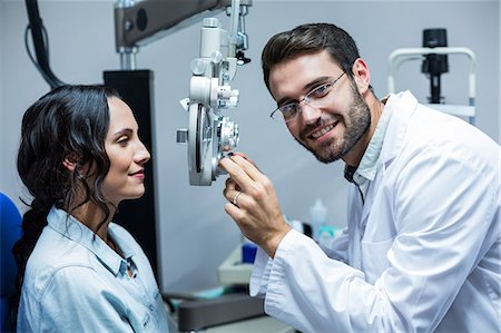 phorometer - Portrait of an optician using a phoropter on his patient Stockbilder - Premium RF Lizenzfrei, Bildnummer: 6109-08204199