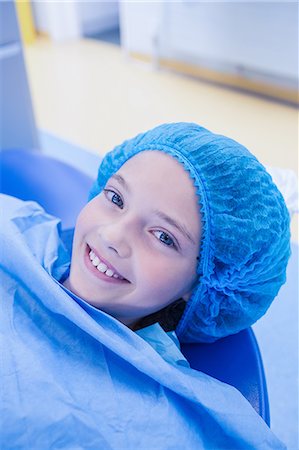 simsearch:6109-08389794,k - Smiling young patient sitting in dentists chair Stockbilder - Premium RF Lizenzfrei, Bildnummer: 6109-08389727