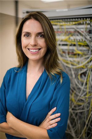 digital - Confident technician smiling at camera Stock Photo - Premium Royalty-Free, Code: 6109-08389895