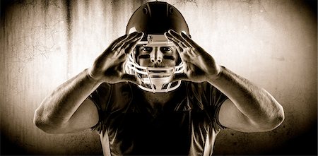 simsearch:6109-08389992,k - Composite image of american football player making hand gesture Stock Photo - Premium Royalty-Free, Code: 6109-08389990
