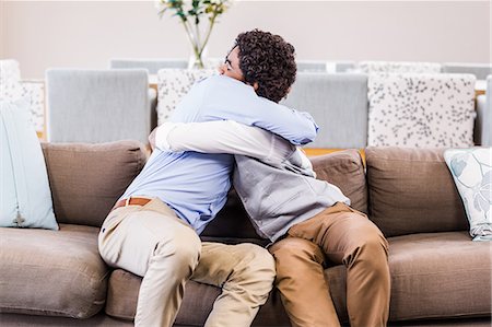 Happy gay couple hugging each other Stock Photo - Premium Royalty-Free, Code: 6109-08390143