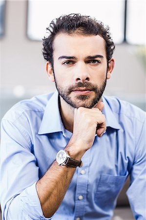 simsearch:6109-08390353,k - Thoughtful man looking at camera Stock Photo - Premium Royalty-Free, Code: 6109-08390165