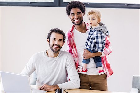 simsearch:6109-08390107,k - Happy gay couple with child posing for camera Stock Photo - Premium Royalty-Free, Code: 6109-08390194