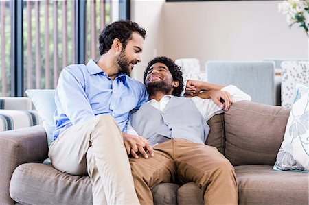 simsearch:6109-08390107,k - Happy gay couple looking to each other Stock Photo - Premium Royalty-Free, Code: 6109-08390127