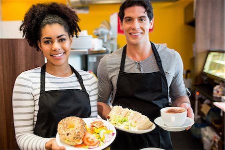 retail sandwich - Staff smiling at camera together Stock Photo - Premium Royalty-Free, Code: 6109-08395970