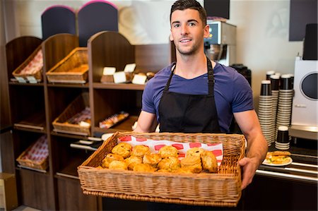 store owner beverages - Handsome waiter smiling at camera Stock Photo - Premium Royalty-Free, Code: 6109-08395982