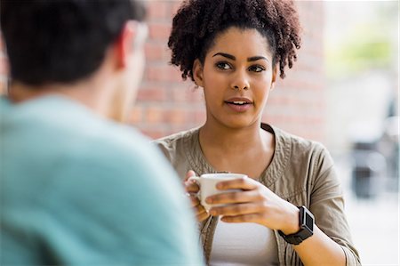 friends talking on college campus - Students chatting in the cafe Stock Photo - Premium Royalty-Free, Code: 6109-08395903