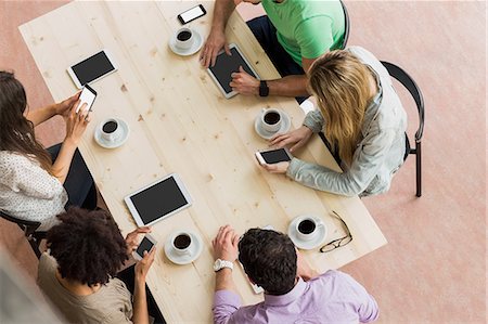 students campus phones - Overhead of students working together Stock Photo - Premium Royalty-Free, Code: 6109-08396071