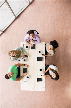 Students working together on an assignment Stock Photo - Premium Royalty-Free, Code: 6109-08396075