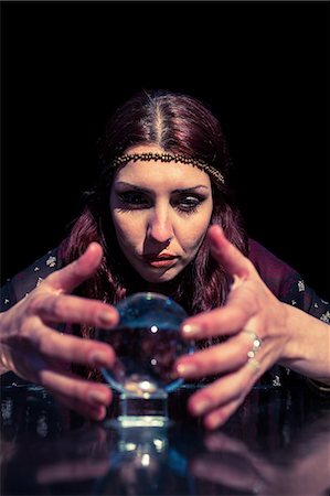 simsearch:400-04180986,k - Fortune teller woman using crystal ball Stock Photo - Premium Royalty-Free, Code: 6109-08396664