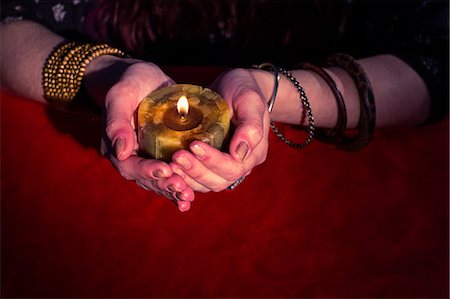simsearch:6109-08396685,k - Fortune teller holding candle Stock Photo - Premium Royalty-Free, Code: 6109-08396712