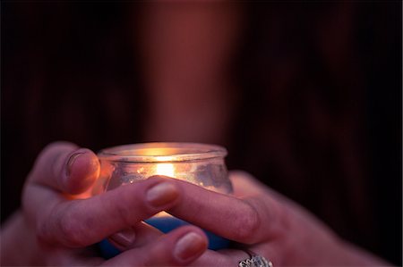 Close-up of fortune teller woman holding candle Stockbilder - Premium RF Lizenzfrei, Bildnummer: 6109-08396718