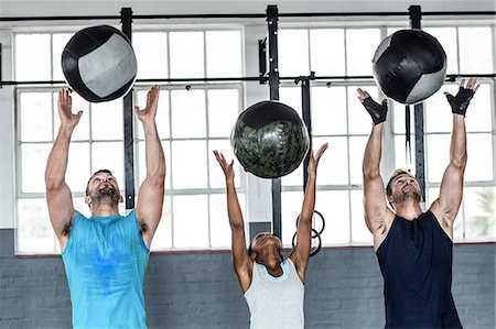 simsearch:6109-07498042,k - Muscular people doing ball exercise together Stock Photo - Premium Royalty-Free, Code: 6109-08396944