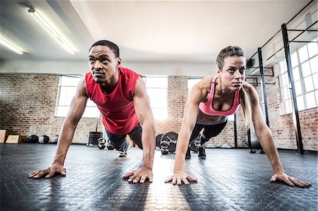 physique - Fit couple doing push ups Stock Photo - Premium Royalty-Free, Code: 6109-08397060