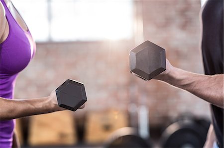 simsearch:673-02138845,k - Fit people doing dumbbell exercises Stock Photo - Premium Royalty-Free, Code: 6109-08397116