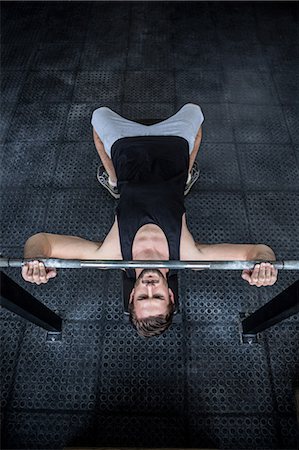 simsearch:6109-08397960,k - Fit man lifting heavy barbell Stock Photo - Premium Royalty-Free, Code: 6109-08398002