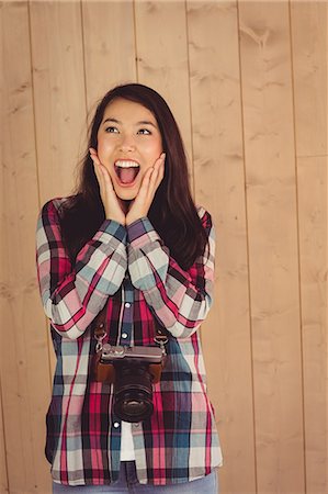 simsearch:6109-08398339,k - Attractive smiling hipster posing at the camera Stock Photo - Premium Royalty-Free, Code: 6109-08398276