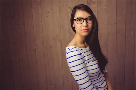 simsearch:6109-08398339,k - Pretty hipster posing for camera Stock Photo - Premium Royalty-Free, Code: 6109-08398340