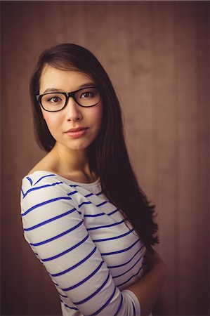 simsearch:6109-08398339,k - Pretty hipster posing for camera Stock Photo - Premium Royalty-Free, Code: 6109-08398342