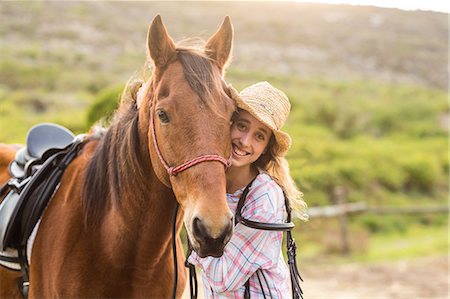 simsearch:6109-08399497,k - Young woman with her horse Foto de stock - Sin royalties Premium, Código: 6109-08398397