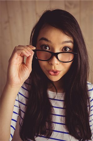 simsearch:6109-08398339,k - Pretty hipster posing for camera Stock Photo - Premium Royalty-Free, Code: 6109-08398338