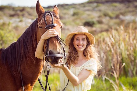 simsearch:6109-08398485,k - Young happy woman with her horse Foto de stock - Sin royalties Premium, Código: 6109-08398443