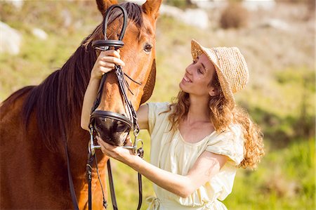 simsearch:6109-08398485,k - Young happy woman with her horse Foto de stock - Sin royalties Premium, Código: 6109-08398441