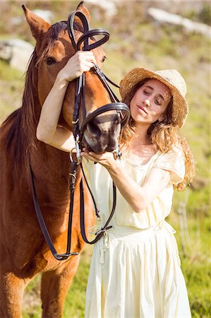 simsearch:6109-08398485,k - Young happy woman with her horse Foto de stock - Sin royalties Premium, Código: 6109-08398442