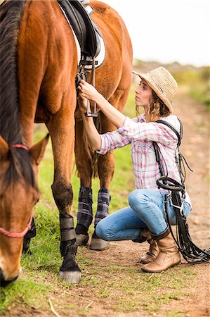 estribo - Young woman walking with her horse Foto de stock - Sin royalties Premium, Código: 6109-08398407