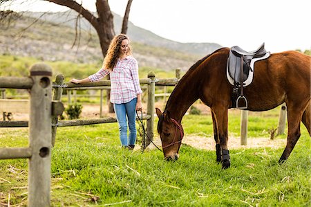 simsearch:400-04489243,k - Young woman with her horse Photographie de stock - Premium Libres de Droits, Code: 6109-08398413