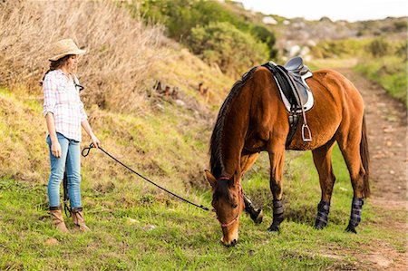 simsearch:400-04489243,k - Young woman with her horse Photographie de stock - Premium Libres de Droits, Code: 6109-08398411