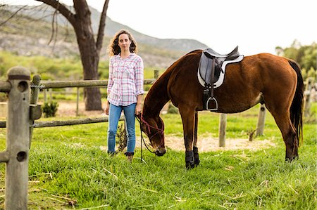 simsearch:6109-08399497,k - Young woman with her horse Foto de stock - Sin royalties Premium, Código: 6109-08398412