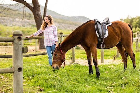 simsearch:400-04489243,k - Young woman with her horse Photographie de stock - Premium Libres de Droits, Code: 6109-08398414